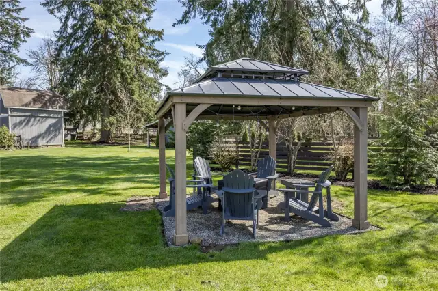 Gather with family and guests under the charming gazebo