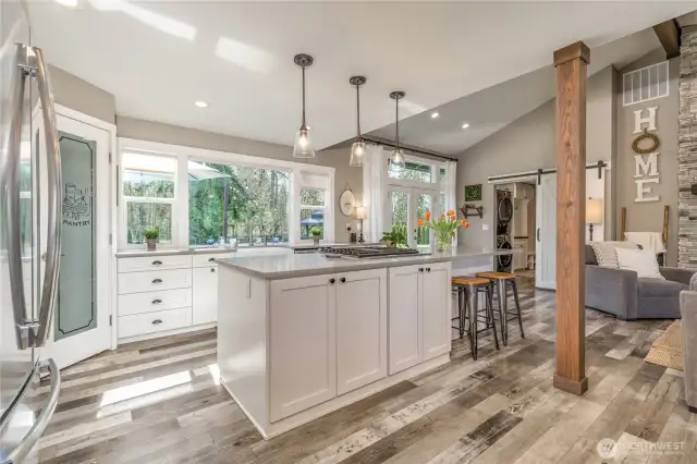 Open concept living area with center kitchen island