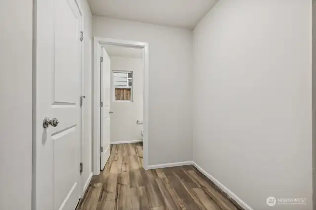 Entry from Garage/Mudroom space-Disclaimer- Photos are of another Warren-2448 floor plan from a previous community, photos are for illustrative purposes only. Finishes, flooring, upgrades, or other features may vary.
