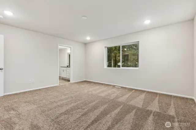 Primary Bedroom-Disclaimer- Photos are of another Warren-2448 floor plan from a previous community, photos are for illustrative purposes only. Finishes, flooring, upgrades, or other features may vary.