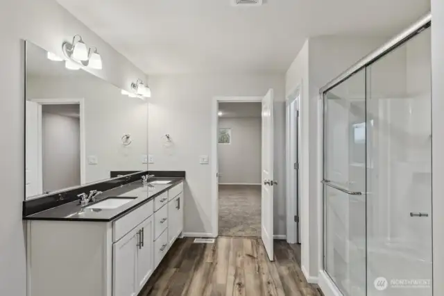 Primary Bath-Disclaimer- Photos are of another Warren-2448 floor plan from a previous community, photos are for illustrative purposes only. Finishes, flooring, upgrades, or other features may vary.