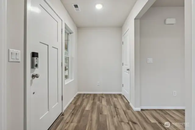 Entry w/Foyer space-Disclaimer- Photos are of another Warren-2448 floor plan from a previous community, photos are for illustrative purposes only. Finishes, flooring, upgrades, or other features may vary.