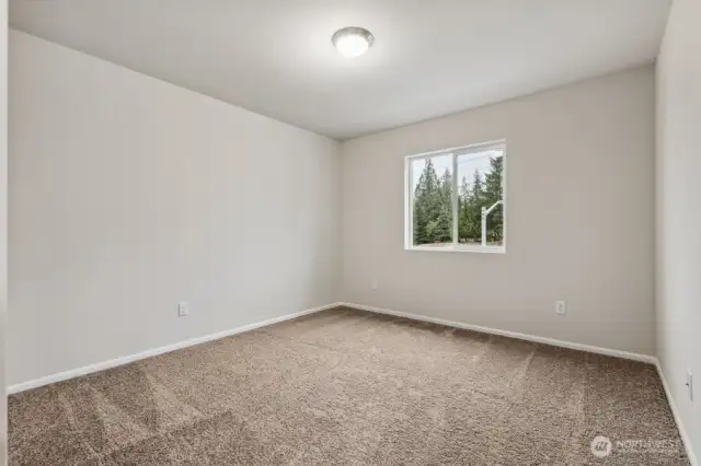 Bedroom #2-Disclaimer- Photos are of another Warren-2448 floor plan from a previous community, photos are for illustrative purposes only. Finishes, flooring, upgrades, or other features may vary.