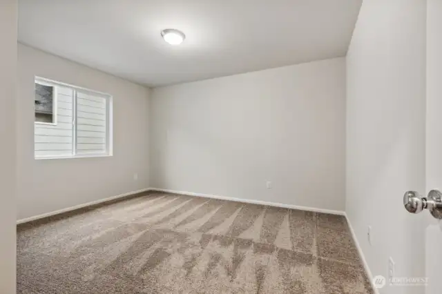 Bedroom #4-Disclaimer- Photos are of another Warren-2448 floor plan from a previous community, photos are for illustrative purposes only. Finishes, flooring, upgrades, or other features may vary.