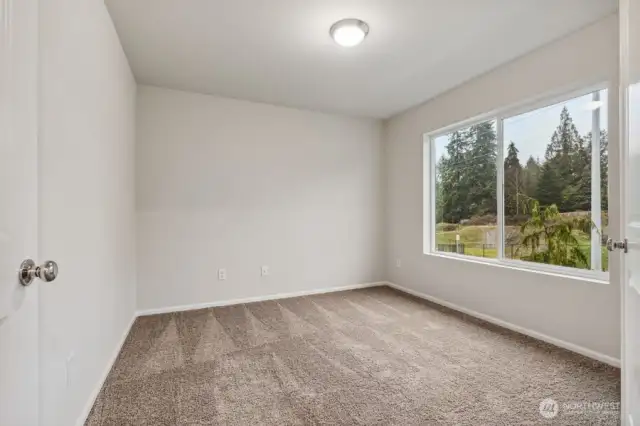 Office/den on main-Disclaimer- Photos are of another Warren-2448 floor plan from a previous community, photos are for illustrative purposes only. Finishes, flooring, upgrades, or other features may vary.