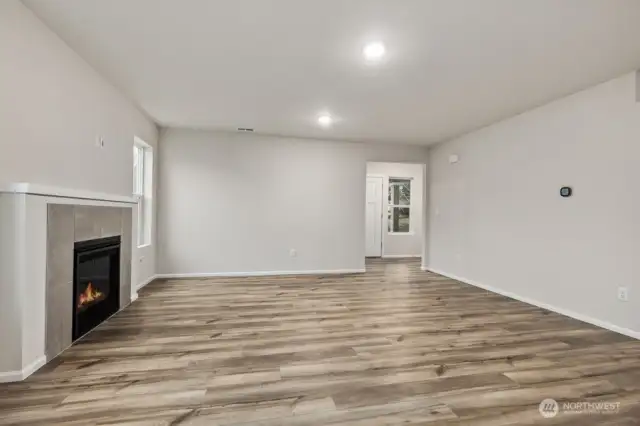 Open Concept Living-Disclaimer- Photos are of another Warren-2448 floor plan from a previous community, photos are for illustrative purposes only. Finishes, flooring, upgrades, or other features may vary.