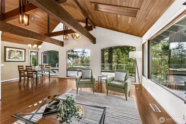 Living area with wood beam vaulted ceilings
