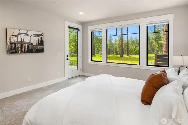 Access to the patio and hot tub from the primary suite.