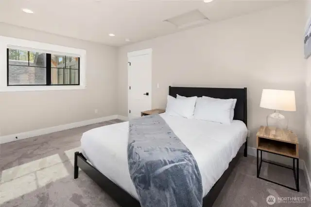 Bedroom on upper level featuring 2 closets.
