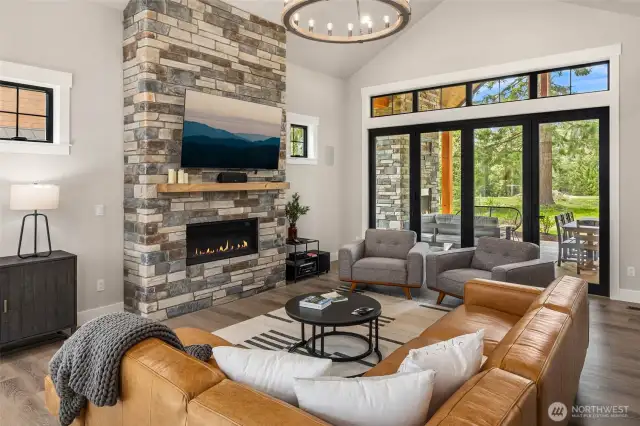 Expansive great room welcomes you in, with an abundance of natural light mixed with cozy vibes.