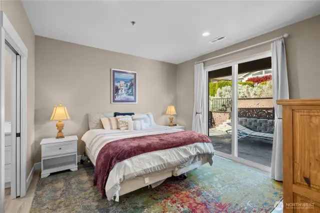 Bedroom 2 with sliding glass door to back patio.