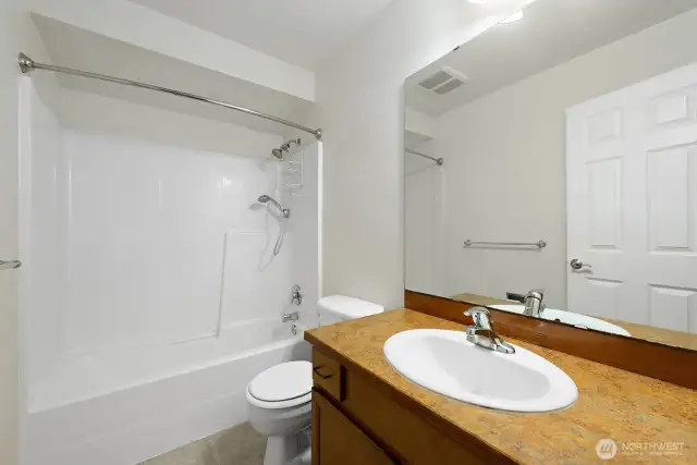 Full bathroom on upper level.