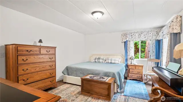 Primary bed with ample space.