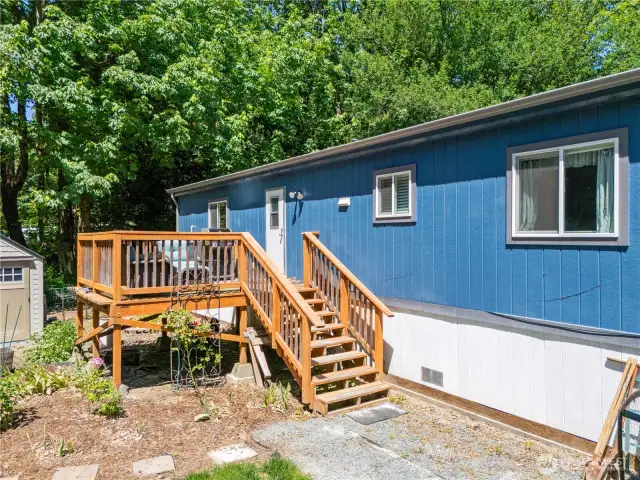 Deck access leads to garden in back.