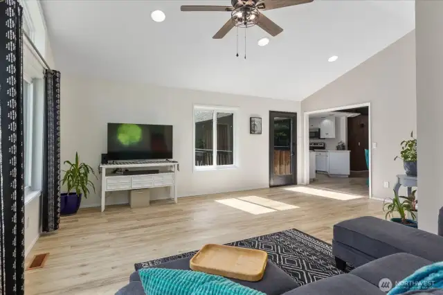 Den/Family Room showing door to deck and entry to kitchen.
