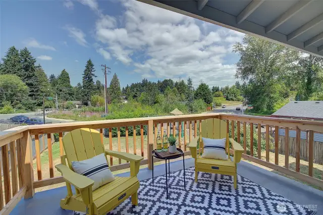 Sunny new back deck overlooking large yard.