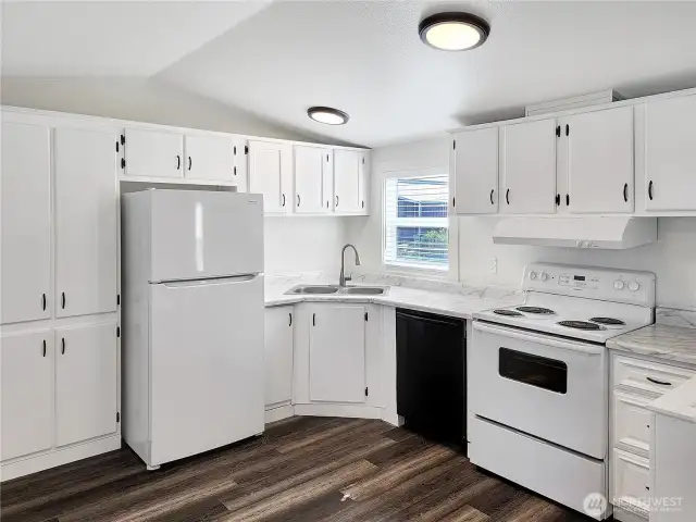 Functional kitchen space with a clean, modern look. The appliances all stay with the home.