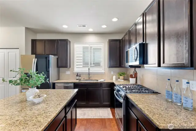 Kitchen with new appliances; granite counters
