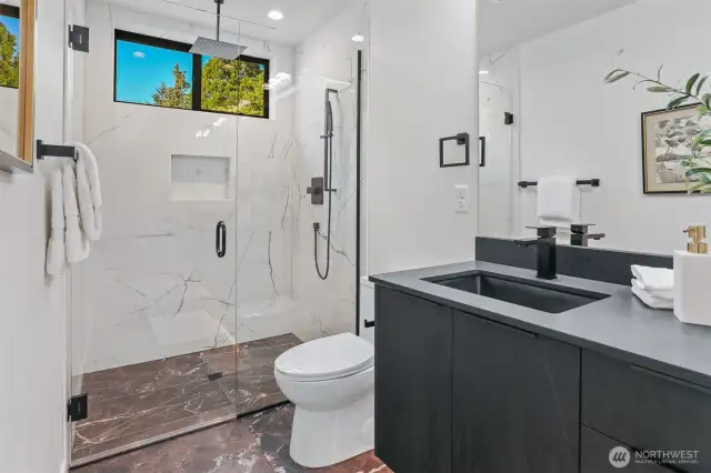 Spa Like Private Suite Bath with Luxury Shower with Stone Floor, Built-In, Rain Head and Handheld