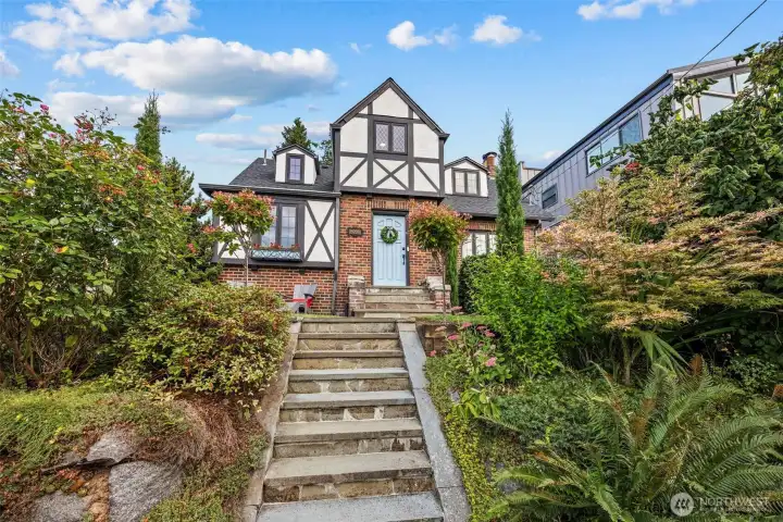 This home blends storybook charm with the timeless craftsmanship that defines Tudor architecture.