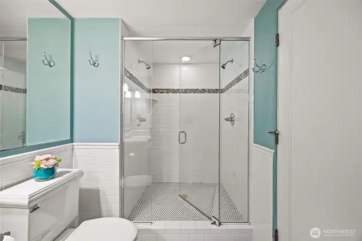 Primary en-suite updated shower off primary bedroom.