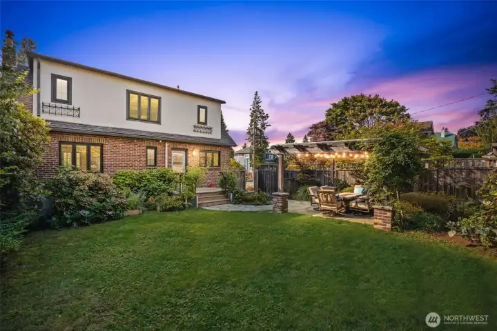 Stunning landscape design compliments the exquisite home perfectly.