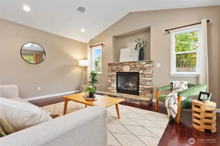 Stone surround on your gas fireplace with TV hookup available in the alcove above