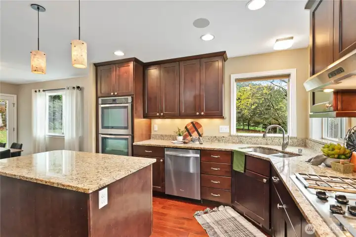 Extra tall cabinets add room for an extra shelf, and lazy-susan corner provide so much storage.