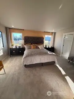 Spacious primary bedroom with plenty of daylight!