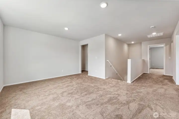 Bonus Room 2nd floor-Disclaimer- Photos are from a similar floor plan from another community, photos are for illustrative purposes only. Finishes, flooring, features, upgrades, countertops, paint, colors, and other features may vary.