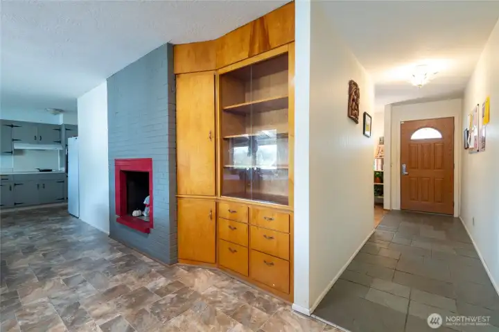 Entrance hallway leads to kitchen.