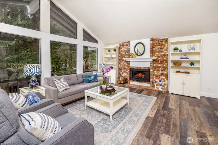 Living room with wood-burning fireplace