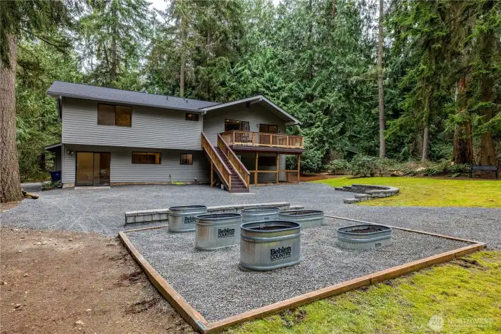 Garden space in the backyard with plenty of sun to grow veggies or flowers