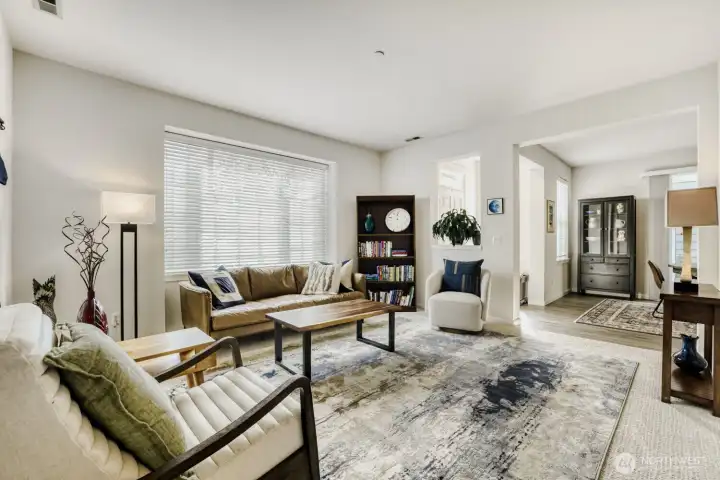 Large picture window allows natural light to stream into the living room.