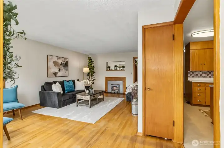 Walking in the front door to the coat closet, living room on the left, kitchen on your right