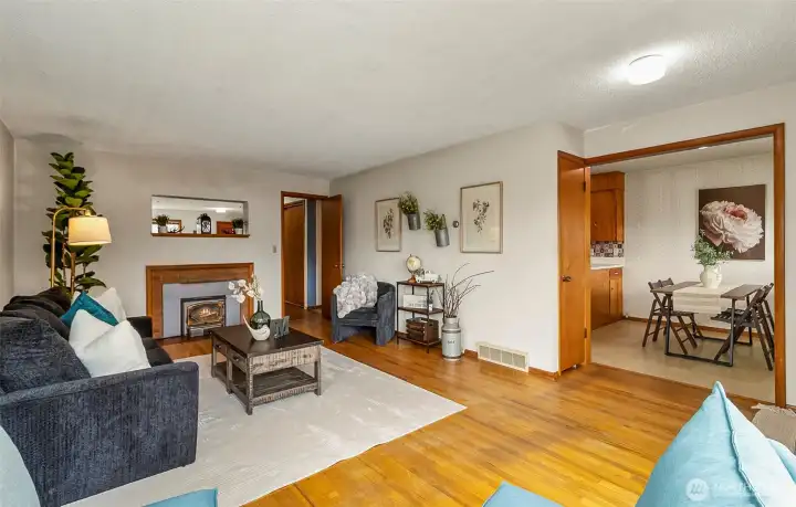 Open concept leading into the dining room from living room