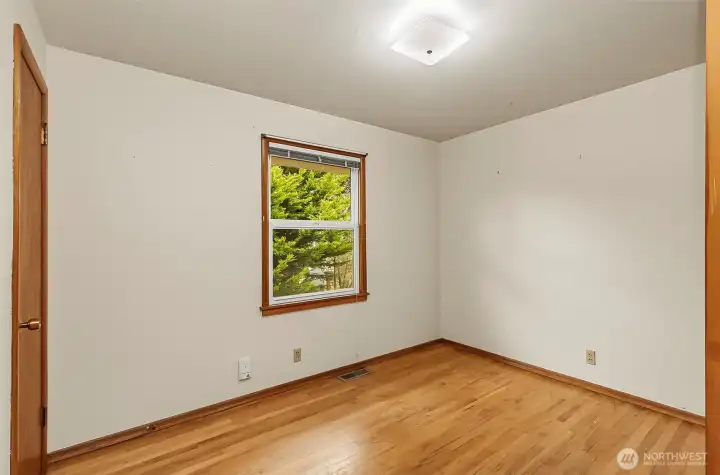 First bedroom to the left, sturdy and great window and closet