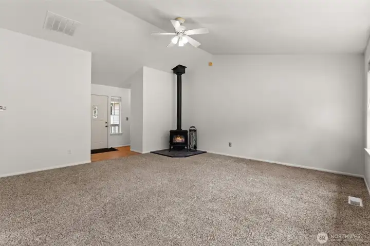 Comfortable oversized living room designed for everyday living, entertaining, and relaxing by the wood stove.