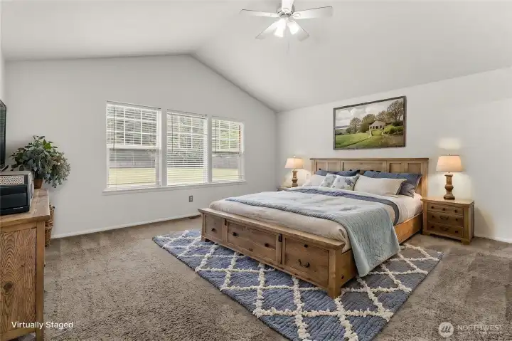 Primary bedroom virtually staged - showing the large space Primary bedroom virtually staged - showing the large space
