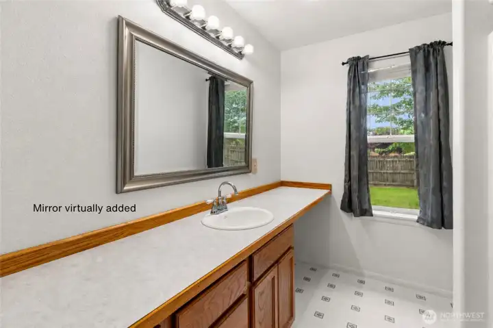 Hall bath with a mirror virtually added Hall bath with a mirror virtually added