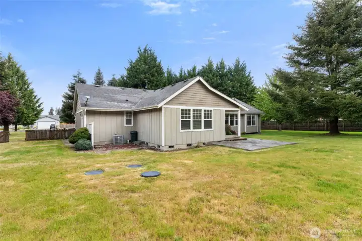 Huge backyard with room to garden, play, entertain, or explore the possibility of a future shop.