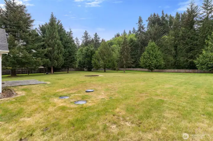 Backyard backs to the neighboring developments greenbelt, adding a peaceful setting and extra sense of privacy.