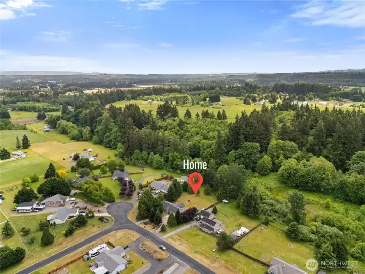 Aerial perspective showcasing the established neighborhood and spacious property setting. Aerial perspective showcasing the established neighborhood and spacious property setting.