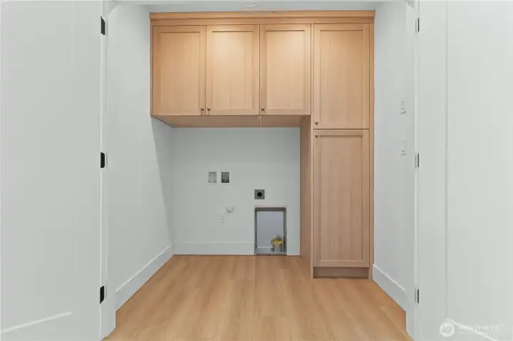 Laundry with cabinetry storage