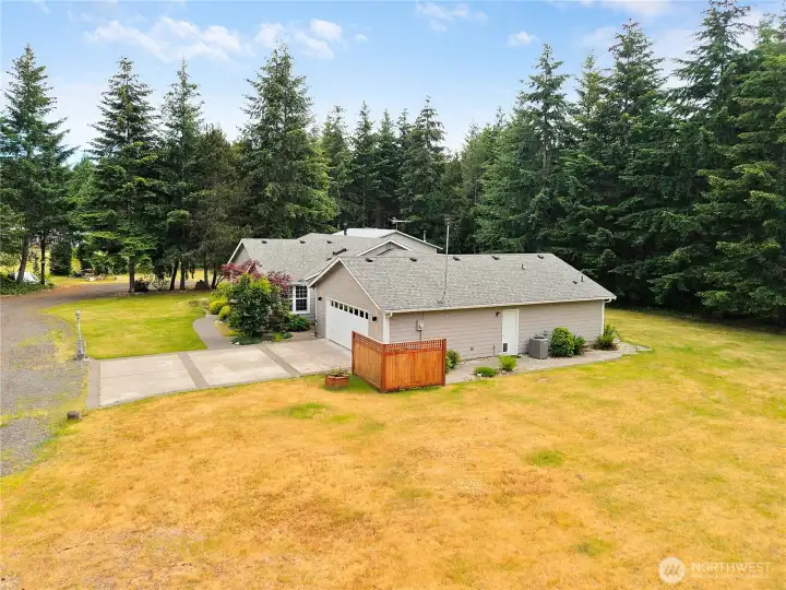 The property is very secluded with stands of evergreens throughout the property.