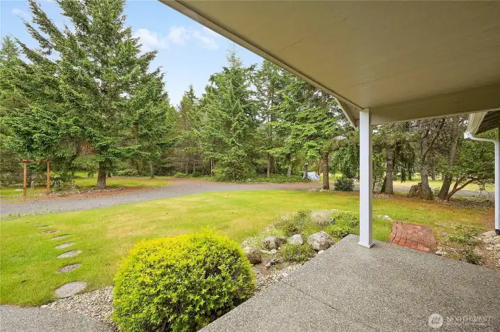 You will enjoy sitting on the front porch, enjoying the tranquil views of this beautiful property.