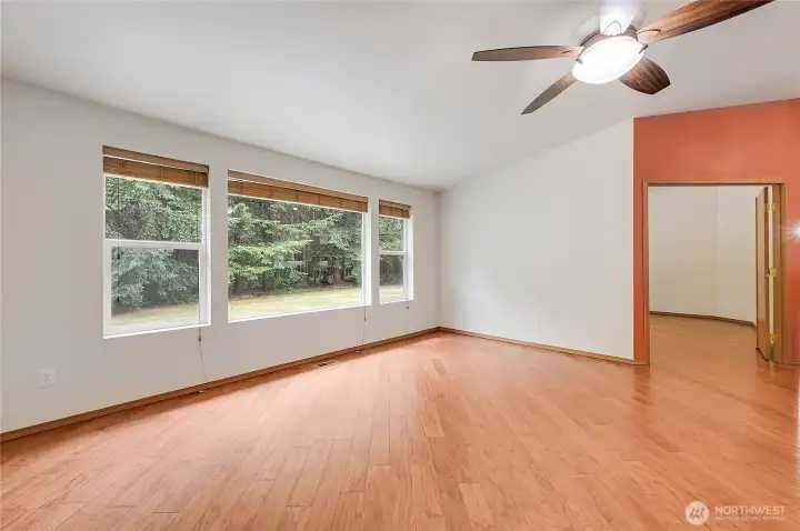 Another view of the dining with lots of natural light and tranquil woods views.