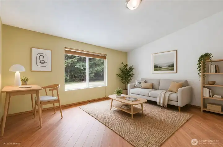 The is the den off the living room, it is virtually staged.