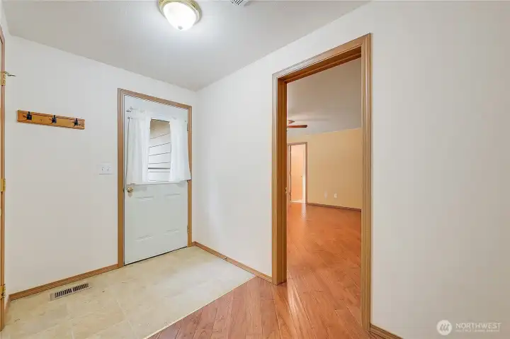 The back door goes out to the spacious back patio.