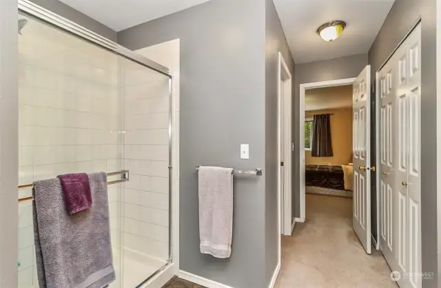 Primary bath also has shower and his and hers closets. One of them being a walk in.